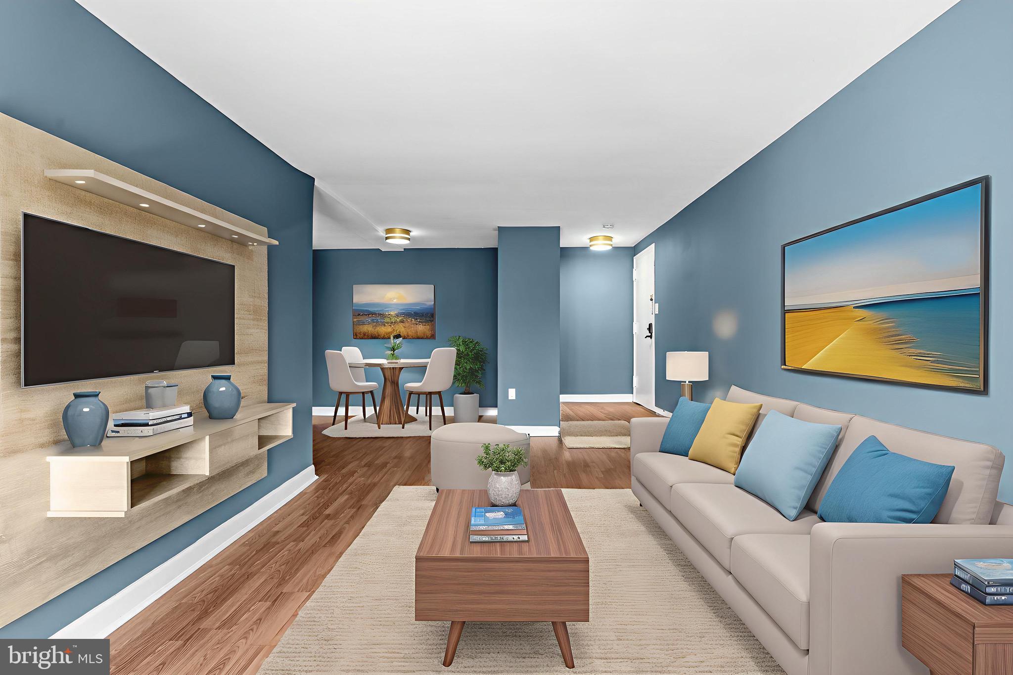 422 Girard Street, Unit 144 Gaithersburg, MD 20877 - Photo 7 of 26 a living room with furniture and a flat screen tv