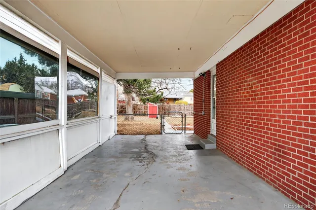 a view of a porch with furniture