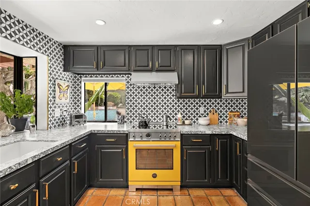 a kitchen with a sink and wooden cabinets
