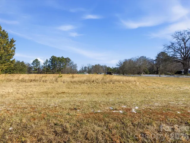 a view of lake with sunset