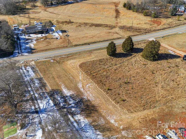 a view of a backyard of the house