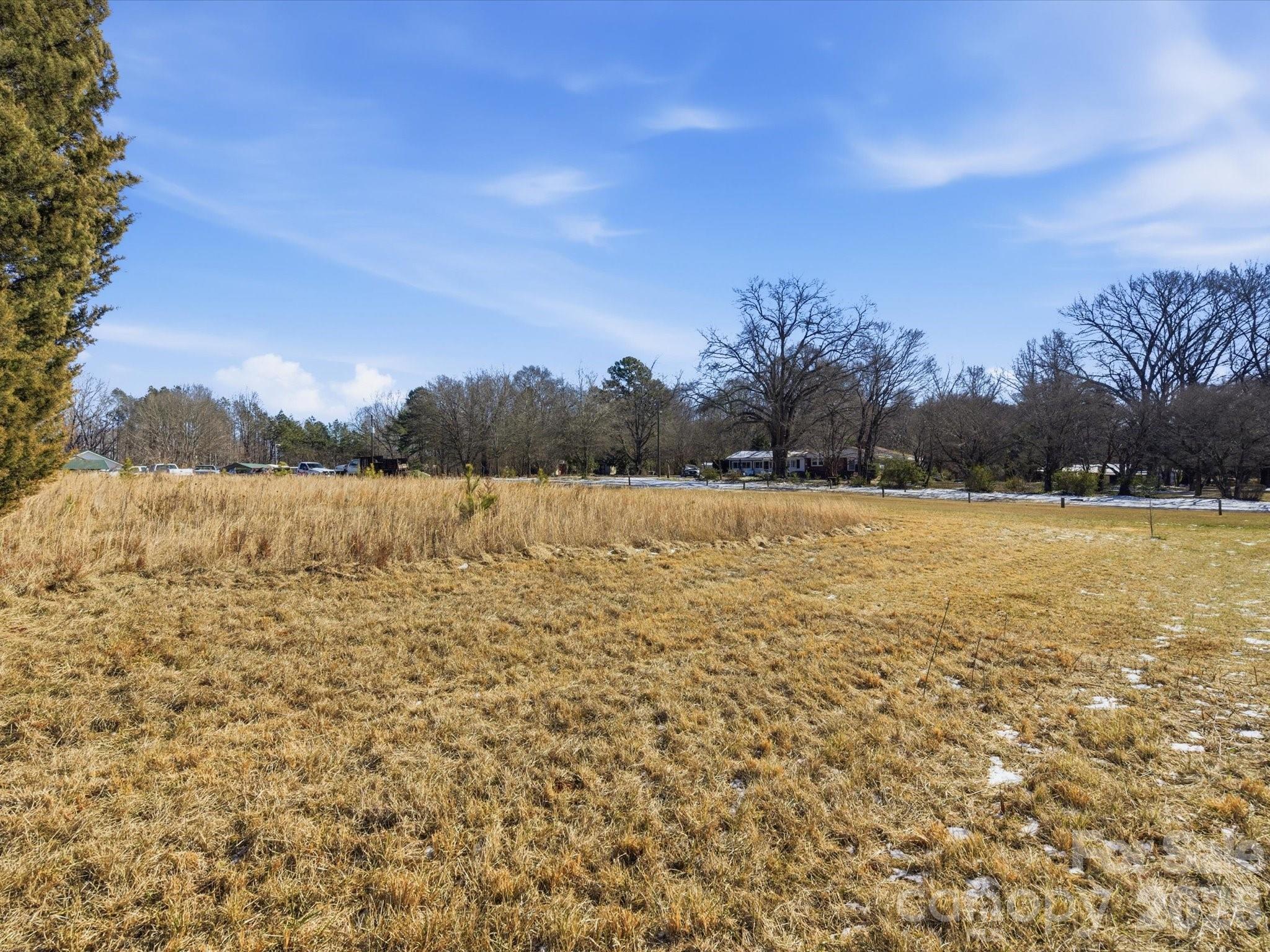 5822 Oakridge Road Clover, SC 29710 - Photo 2 of 29 a view of lake and sunset