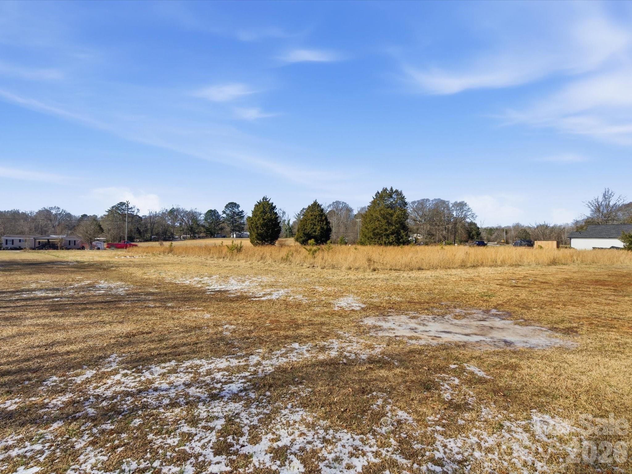 5822 Oakridge Road Clover, SC 29710 - Photo 6 of 29 a view of lake with sunset