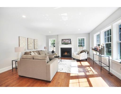 161 Peter Spring Road Concord, MA 01742 - Photo 12 of 17 a living room with furniture and a fireplace
