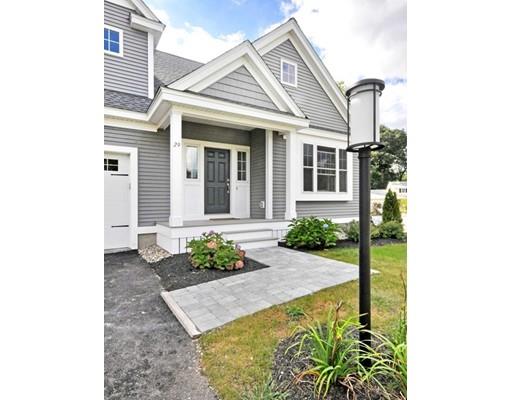 161 Peter Spring Road Concord, MA 01742 - Photo 2 of 17 a front view of a house with garden