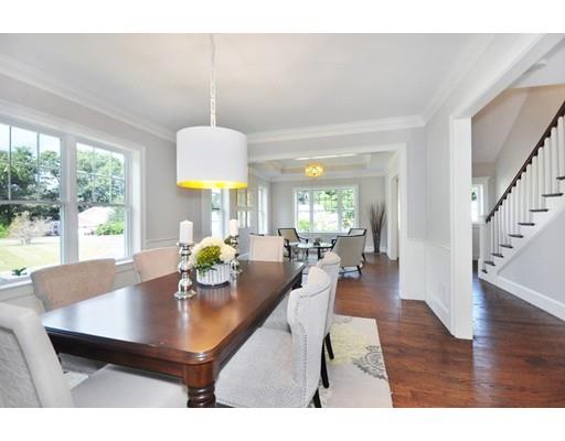 161 Peter Spring Road Concord, MA 01742 - Photo 7 of 17 a living room with dining table couches and a dining table with garden view