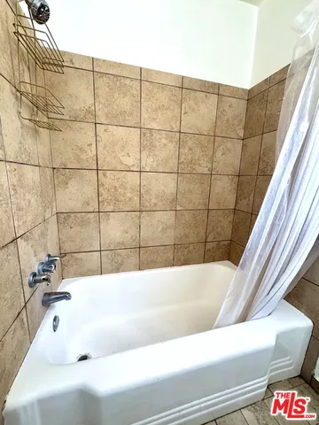 a bathroom with a bathtub