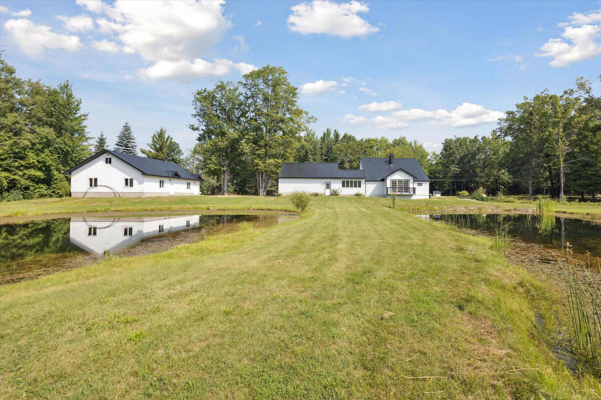 3441 Townline Road Houghton Lake, MI 48629 - Photo 35 of 53 Pond View Back