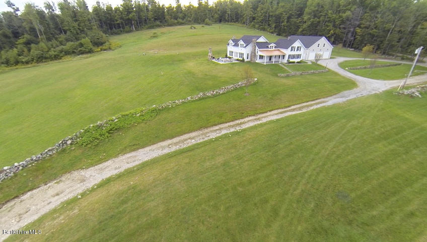 40 Viets Road Sandisfield, MA 01255 - Photo 16 of 92 a view of a golf course with a lake