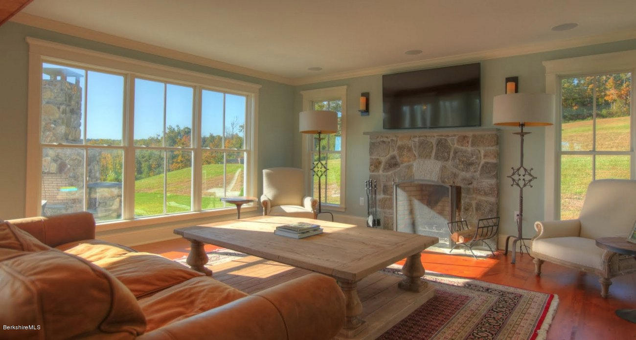 40 Viets Road Sandisfield, MA 01255 - Photo 30 of 92 a bedroom with a bed and a fireplace