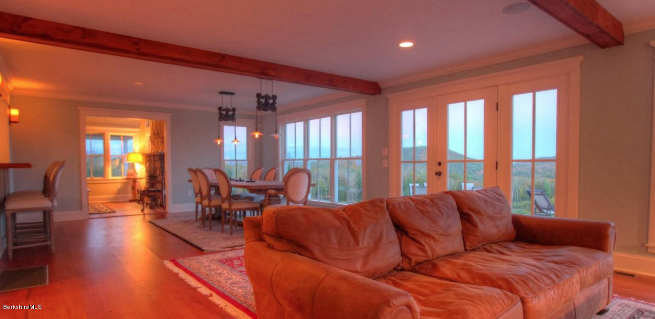 40 Viets Road Sandisfield, MA 01255 - Photo 32 of 92 a large bedroom with bed and large windows