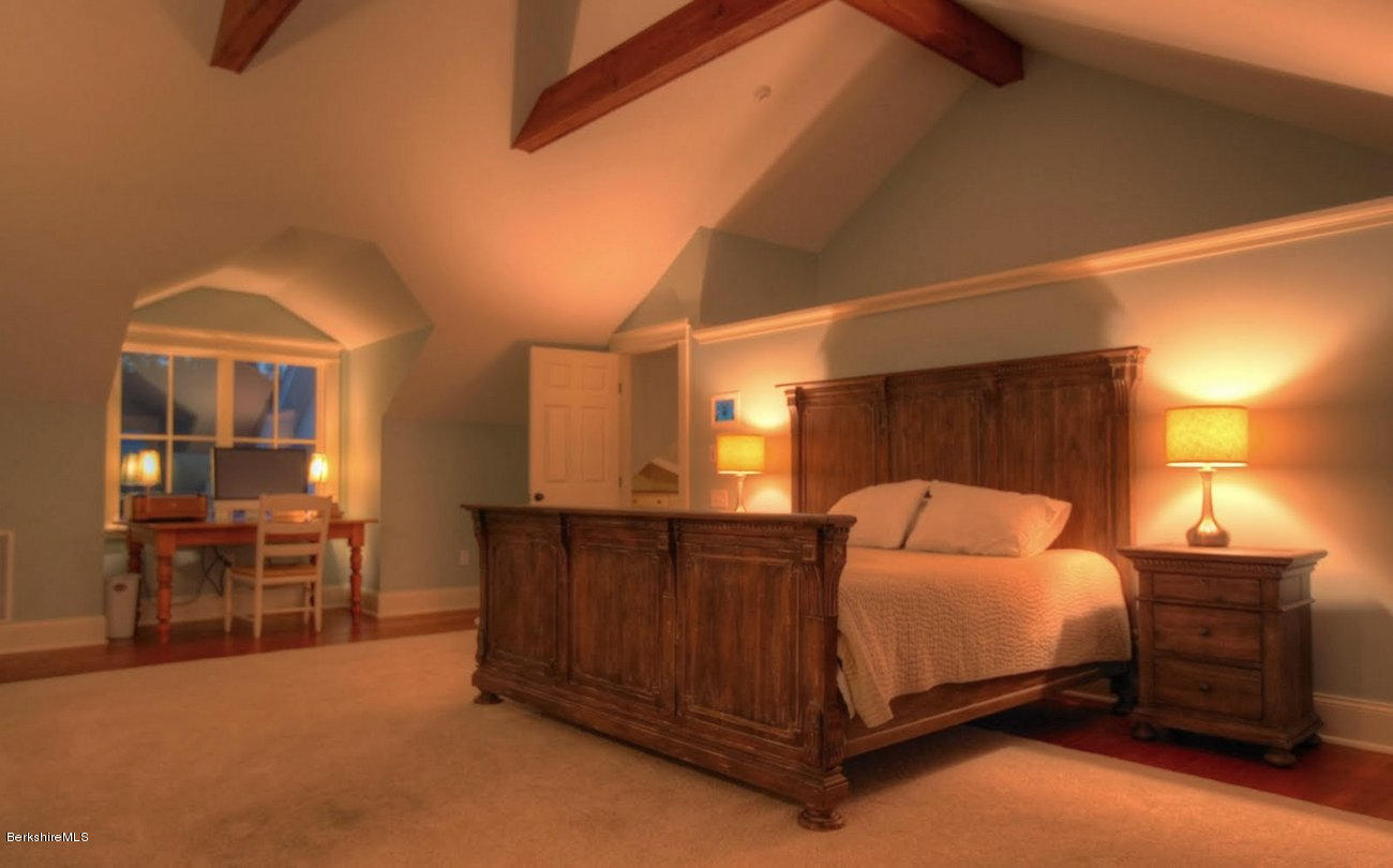 40 Viets Road Sandisfield, MA 01255 - Photo 38 of 92 a bedroom with a bed and wooden furniture