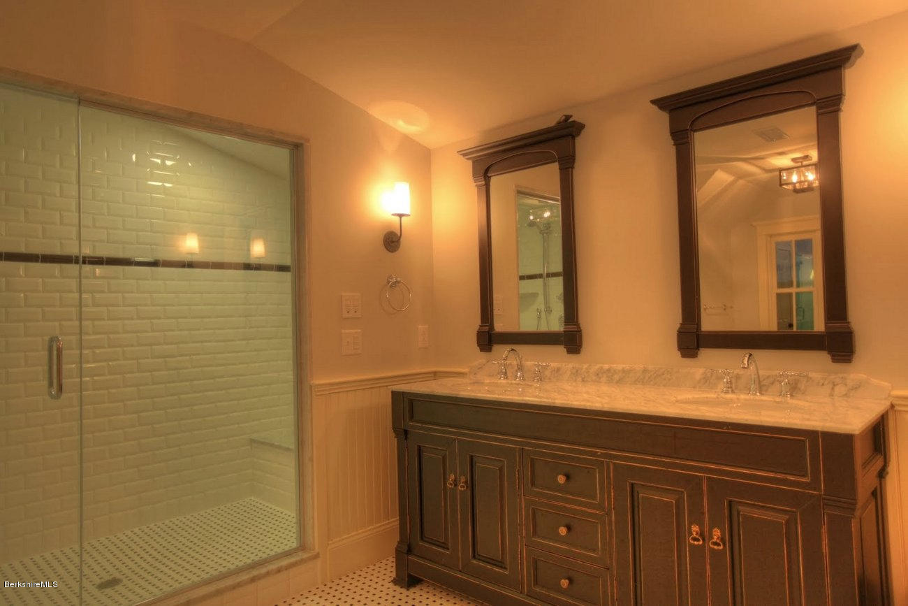 40 Viets Road Sandisfield, MA 01255 - Photo 48 of 92 a bathroom with a double vanity sink and a mirror