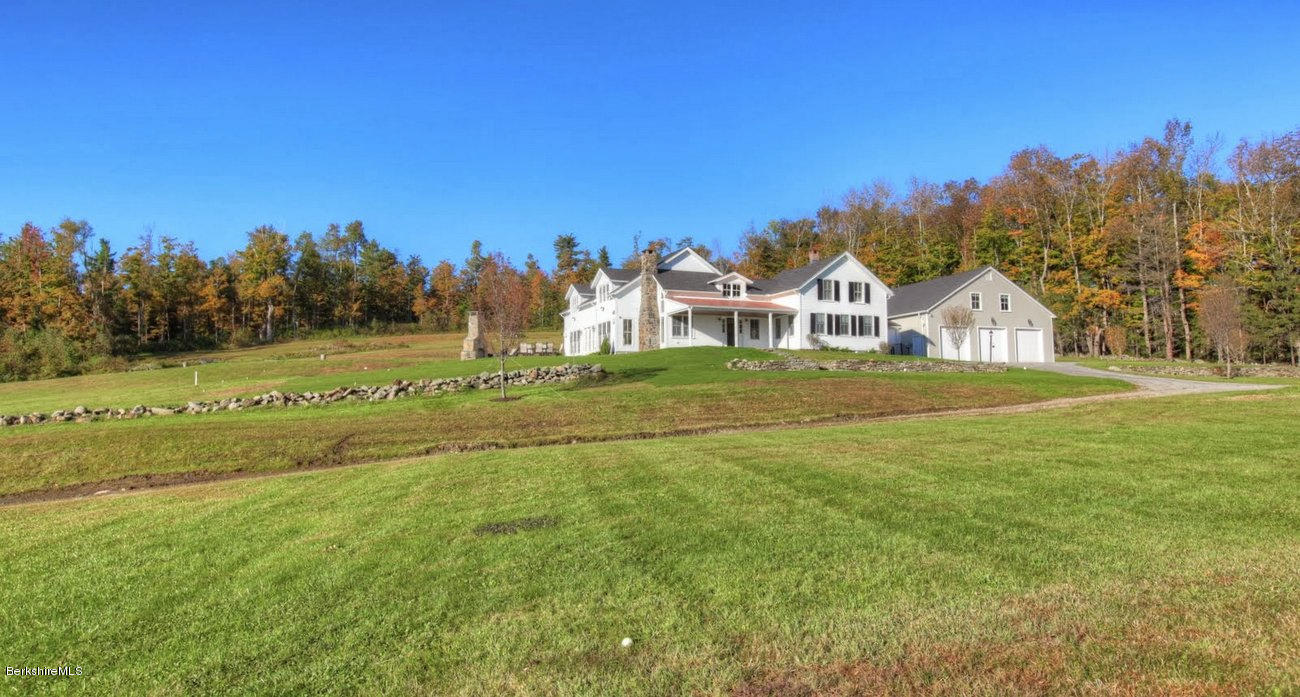 40 Viets Road Sandisfield, MA 01255 - Photo 64 of 92 a view of a big house with a big yard and large trees