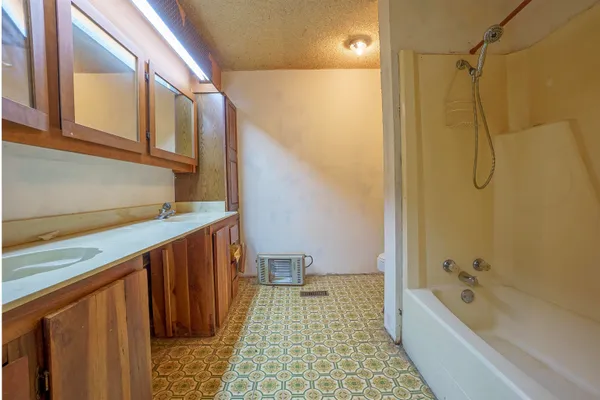 a bathroom with a sink and a vanity