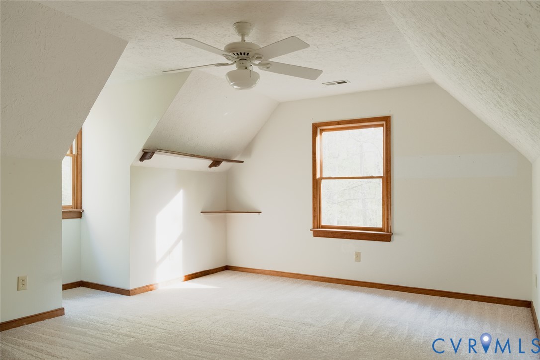 2477 Calno Road Hanover, VA 23069 - Photo 16 of 33 an empty room with windows and fan