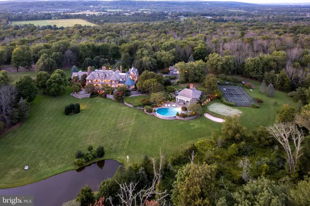 an aerial view of a house with a garden