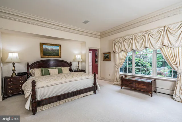 a bathroom with a granite countertop sink and a bathtub
