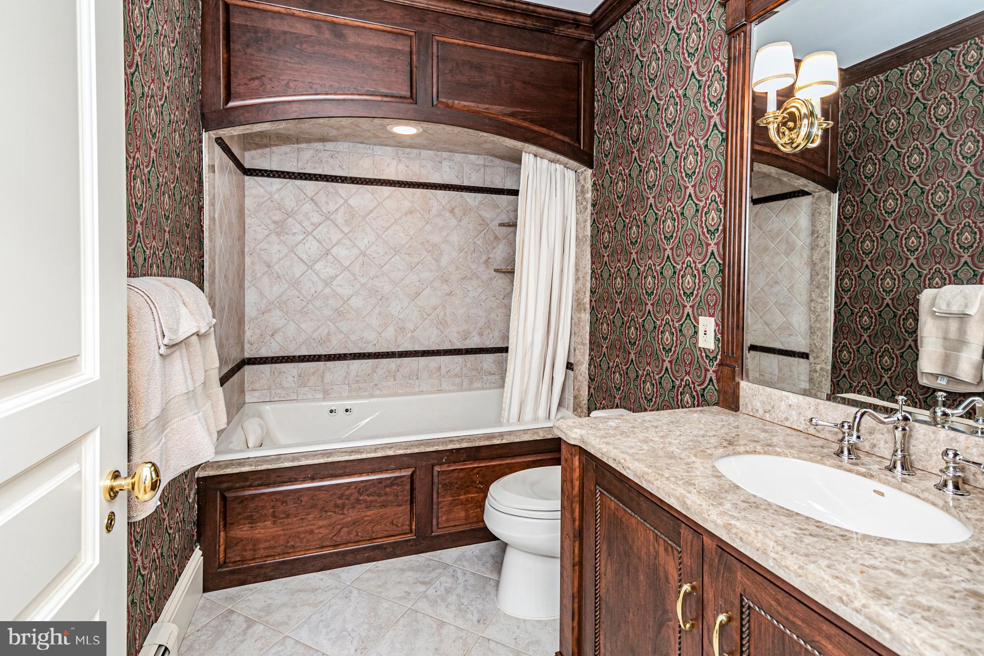 82 Aunt Molly Road Hopewell, NJ 08525 - Photo 27 of 55 a bathroom with a granite countertop sink a toilet and bathtub