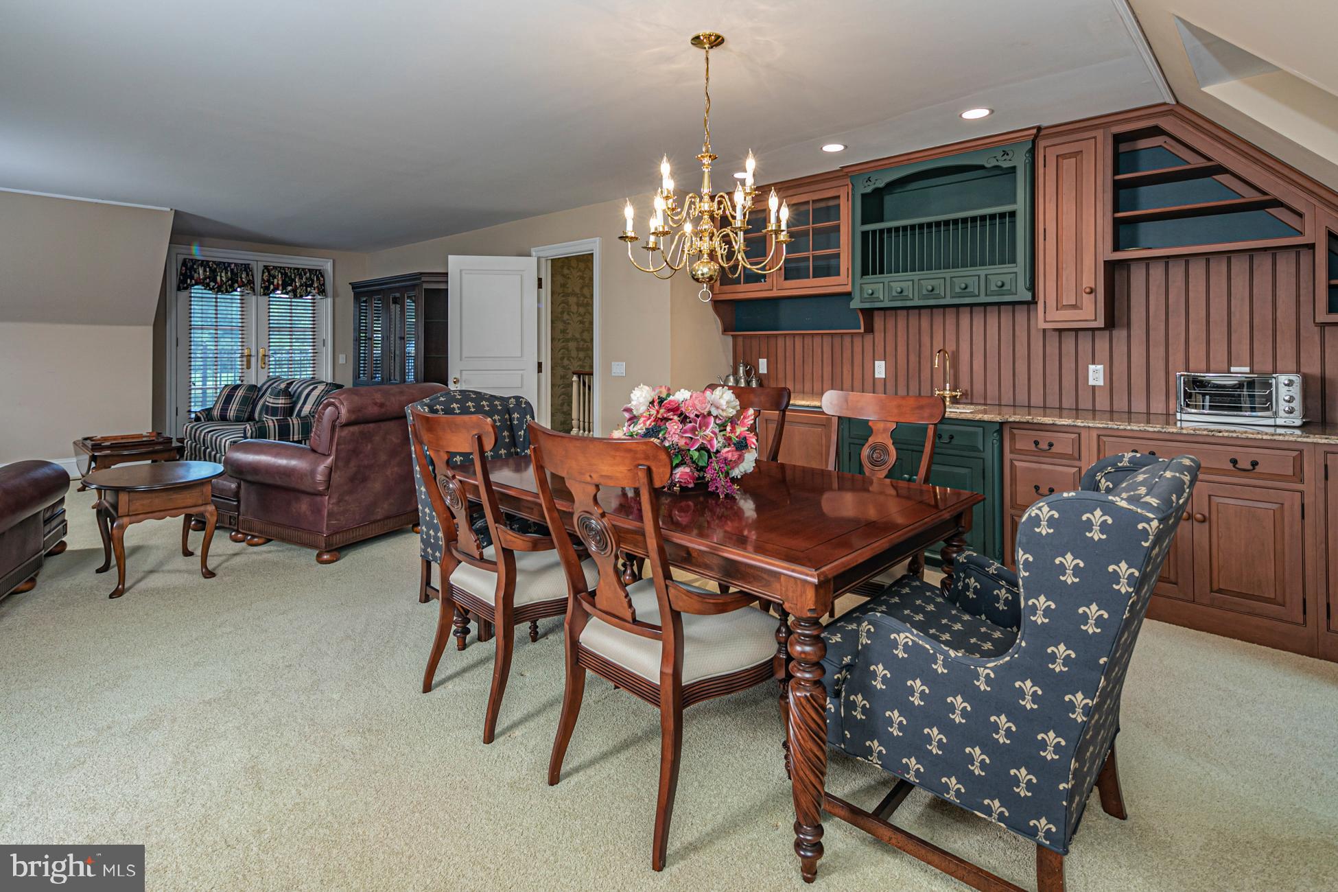 82 Aunt Molly Road Hopewell, NJ 08525 - Photo 30 of 55 a view of a dining room with furniture and chandelier