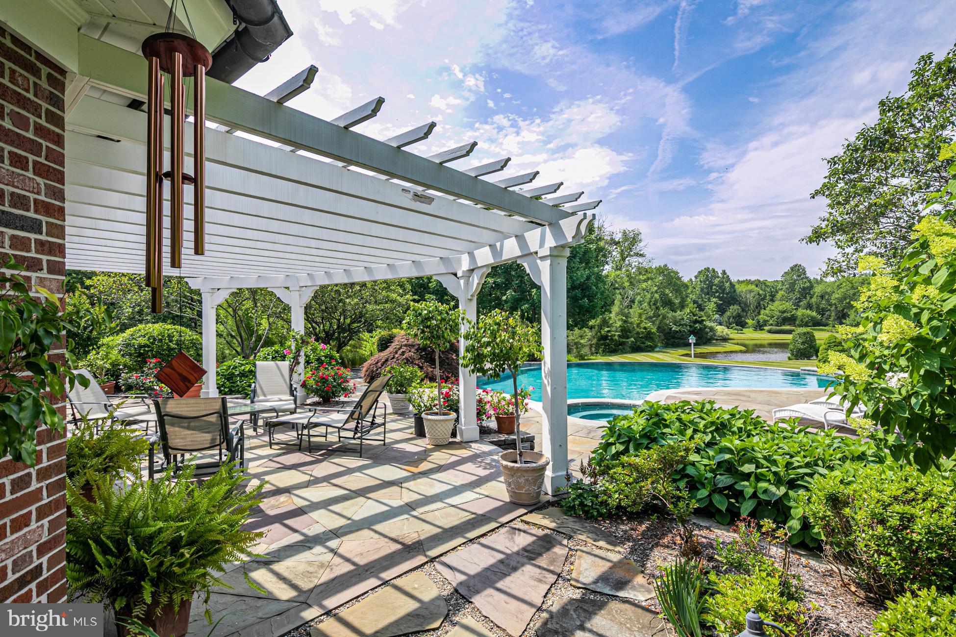 82 Aunt Molly Road Hopewell, NJ 08525 - Photo 40 of 55 a view of a swimming pool with a patio