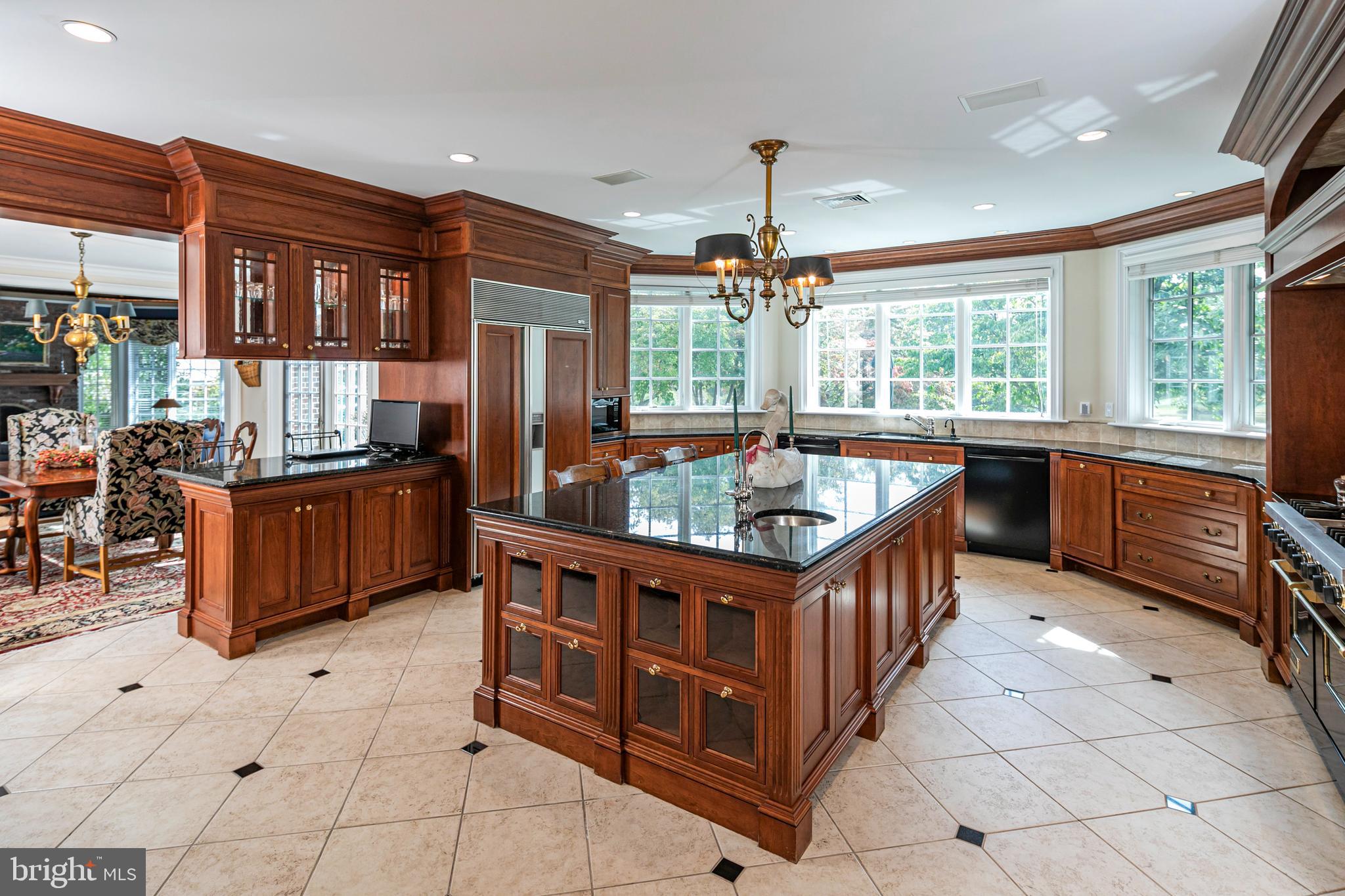 82 Aunt Molly Road Hopewell, NJ 08525 - Photo 7 of 55 a kitchen with stainless steel appliances granite countertop a sink and cabinets