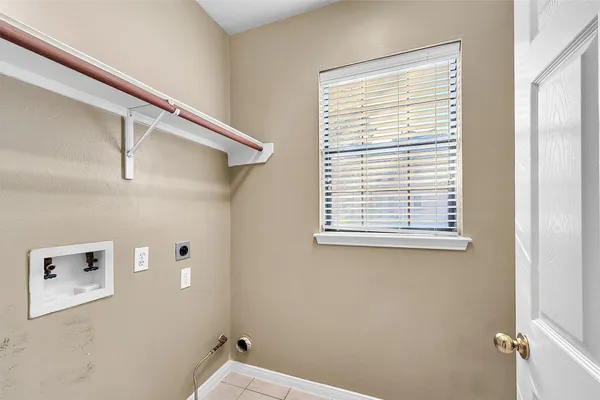 a bathroom with a sink toilet and a mirror