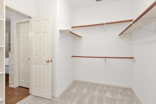 a view of an empty walk in closet