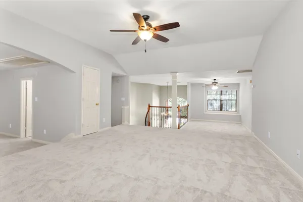 a view of a livingroom with a ceiling fan