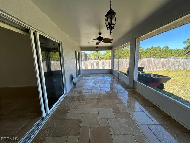 a view of hallway with a large window
