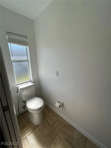 a bathroom with a toilet