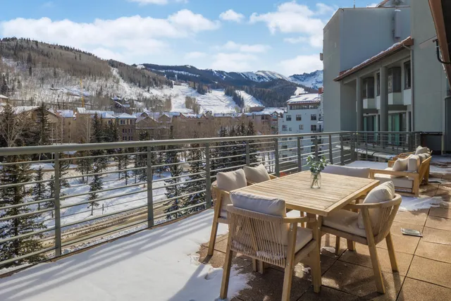 a view of a terrace with furniture