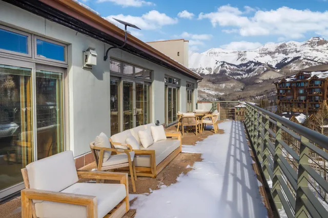 a building outdoor space with patio furniture