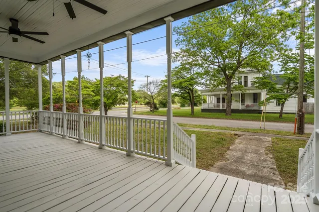a view of a swimming pool with a patio