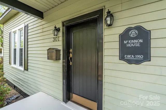 a view of a door and a street