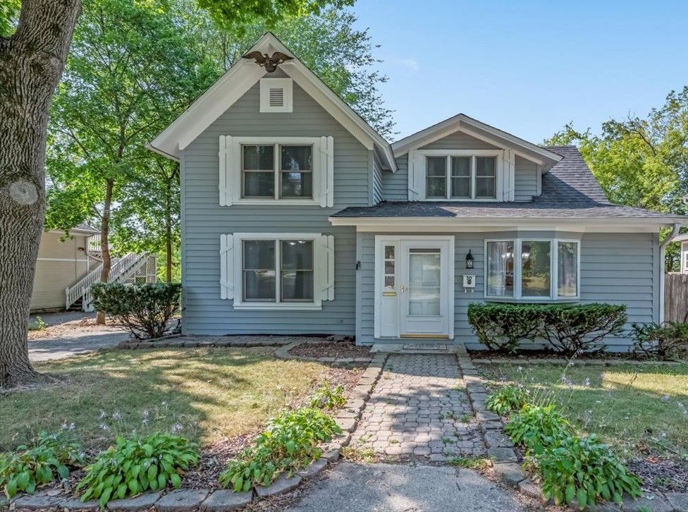 30 Crissey Avenue Geneva, IL 60134 - Photo 2 of 48 a front view of a house with a yard