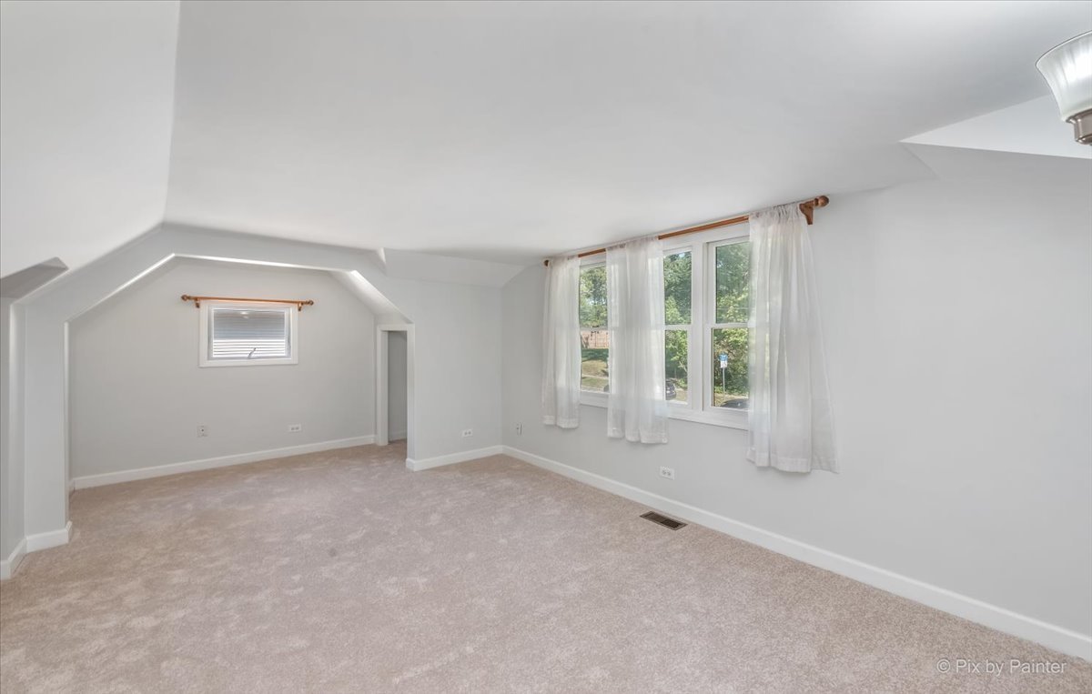 30 Crissey Avenue Geneva, IL 60134 - Photo 20 of 48 an empty room with a empty space and windows
