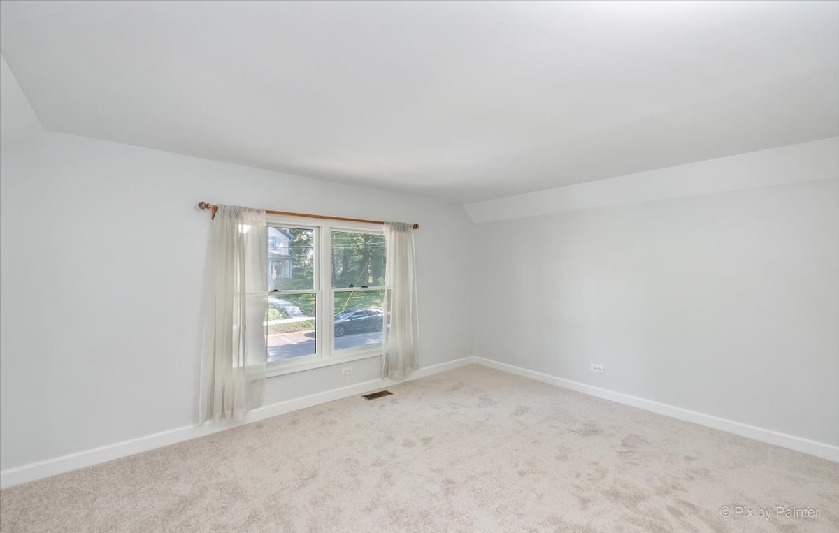 30 Crissey Avenue Geneva, IL 60134 - Photo 23 of 48 an empty room with windows