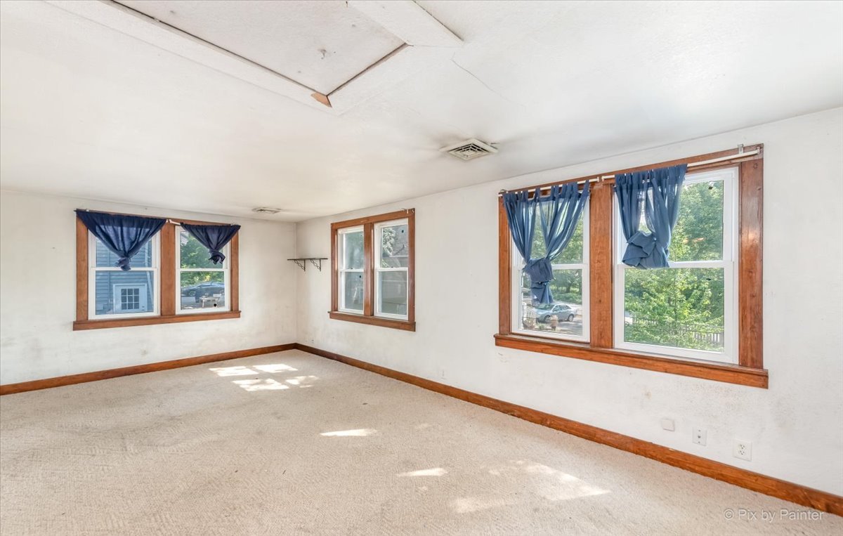 30 Crissey Avenue Geneva, IL 60134 - Photo 27 of 48 a view of an empty room with a window