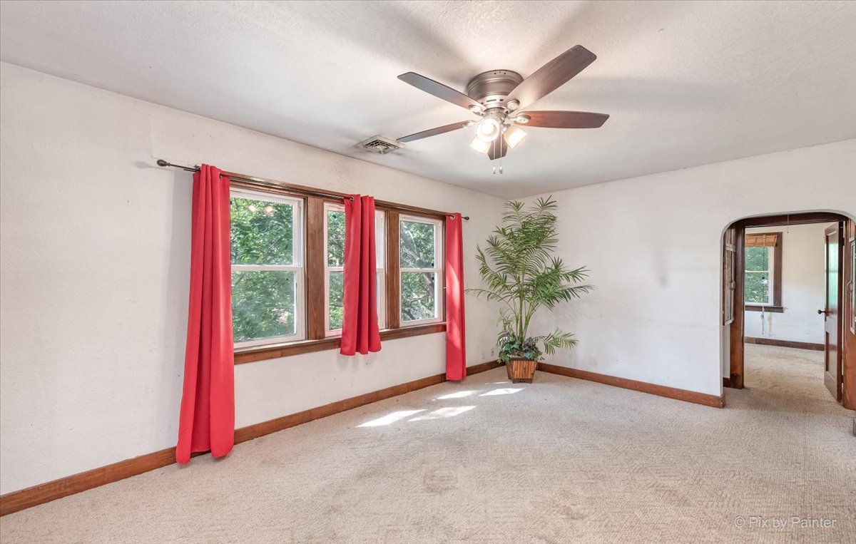30 Crissey Avenue Geneva, IL 60134 - Photo 29 of 48 a view of a livingroom with a ceiling fan and window