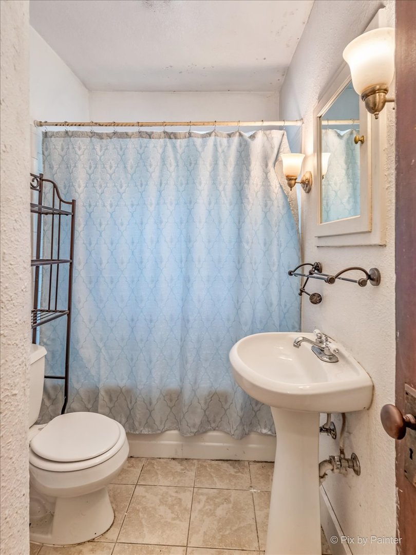 30 Crissey Avenue Geneva, IL 60134 - Photo 36 of 48 a bathroom with a sink toilet and shower