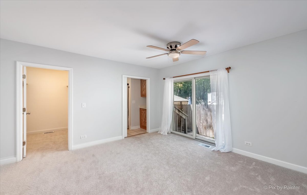 30 Crissey Avenue Geneva, IL 60134 - Photo 5 of 48 a view of an empty room with glass door