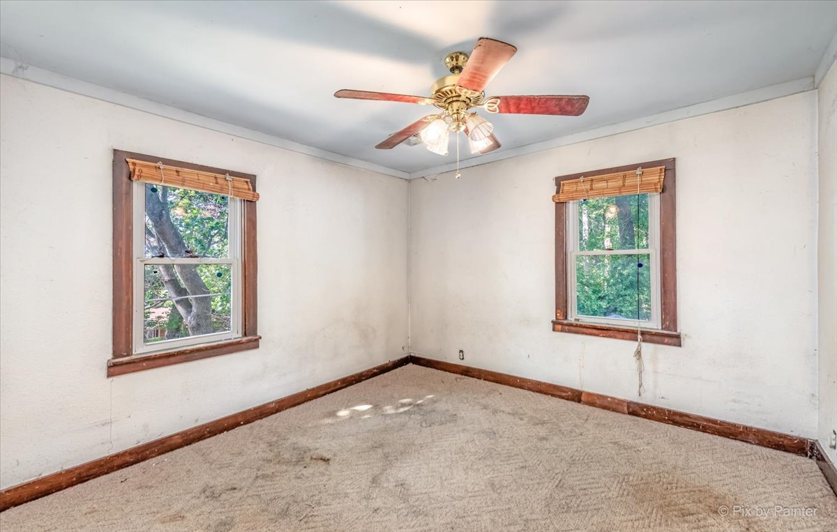 30 Crissey Avenue Geneva, IL 60134 - Photo 41 of 48 an empty room with a window and a fan