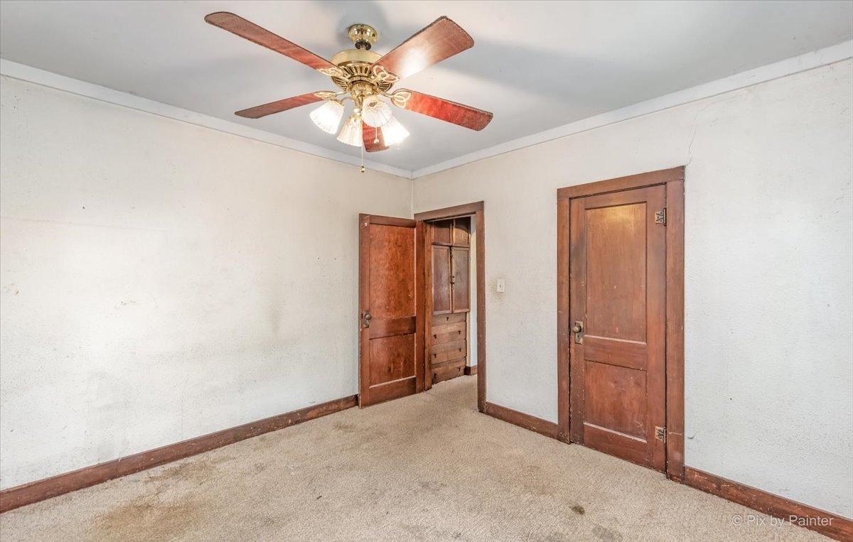 30 Crissey Avenue Geneva, IL 60134 - Photo 42 of 48 an empty room with chandelier fan