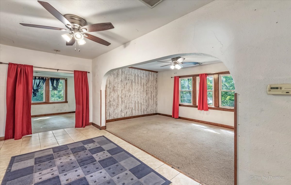 30 Crissey Avenue Geneva, IL 60134 - Photo 43 of 48 a view of a livingroom with a ceiling fan and window