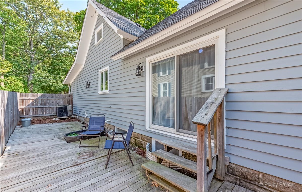 30 Crissey Avenue Geneva, IL 60134 - Photo 47 of 48 a view of deck with chairs and wooden fence