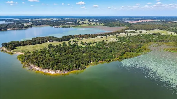 a view of a lake with a city