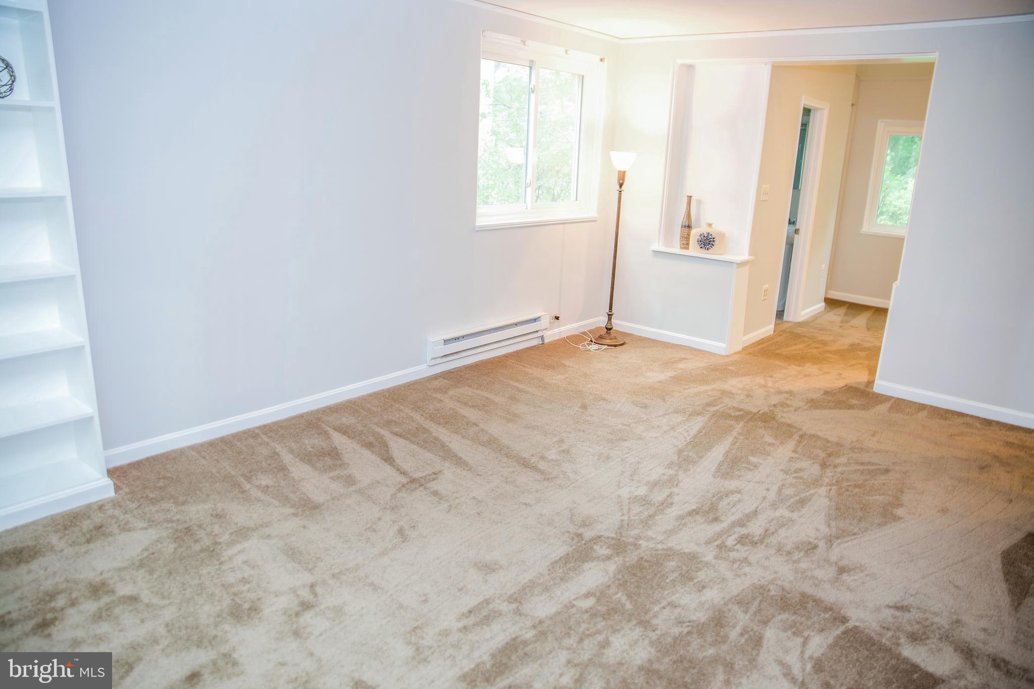 6 Ridge Road, Unit R Greenbelt, MD 20770 - Photo 4 of 20 New paint and carpet in the living room