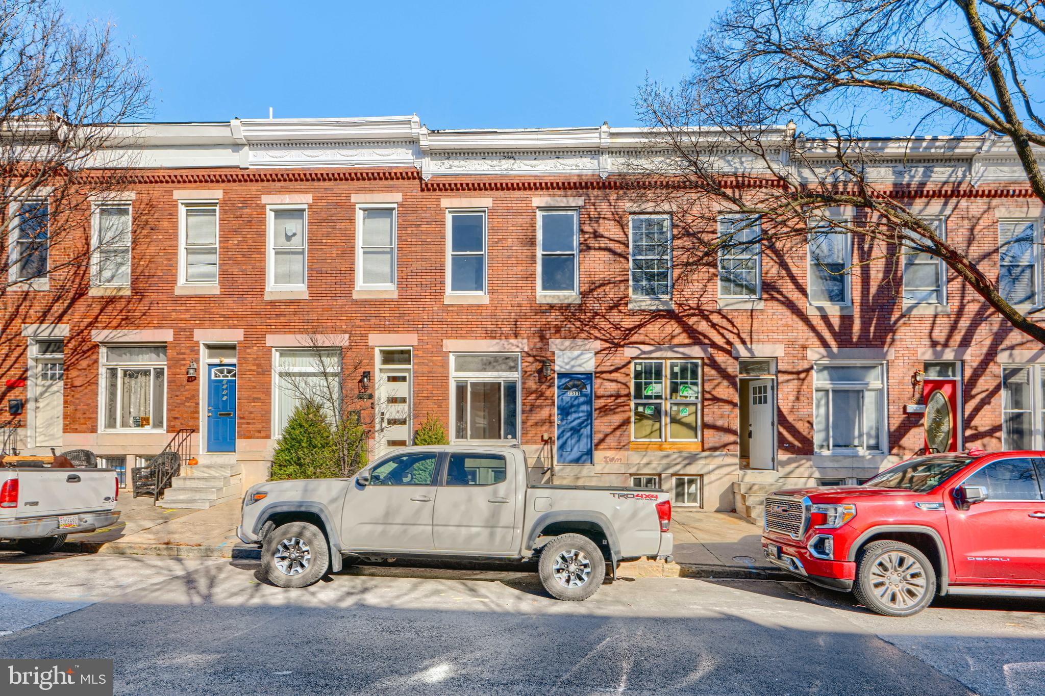 2511 McCulloh Street Baltimore, MD 21217 - Photo 2 of 32 a car parked in front of a building