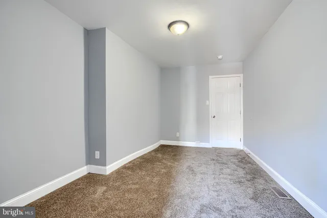 an empty room with an entryway